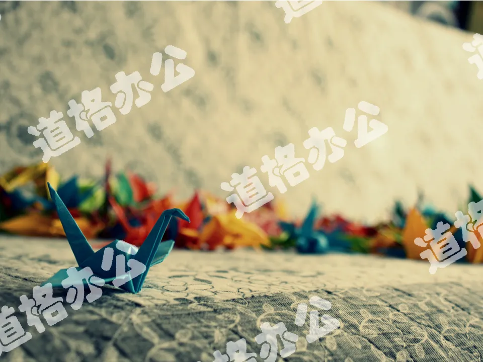 Three colorful paper cranes PPT background pictures
